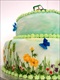 Wedding Cake with painted field flowers and an icing tractor - side view